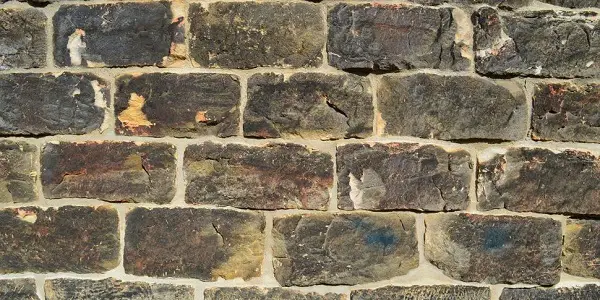 can you damp proof a solid stone wall